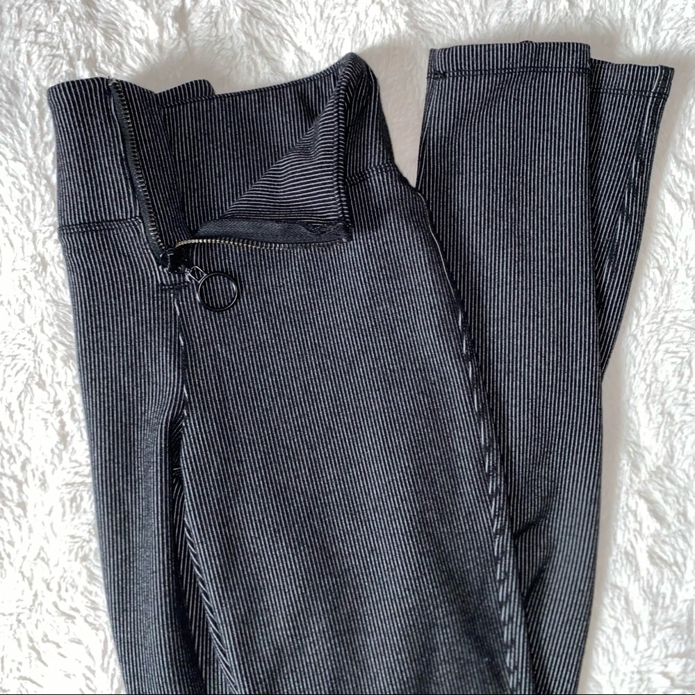 BLACK AND WHITE MICRO PINSTRIPE SKINNY ZIPPER PANTS